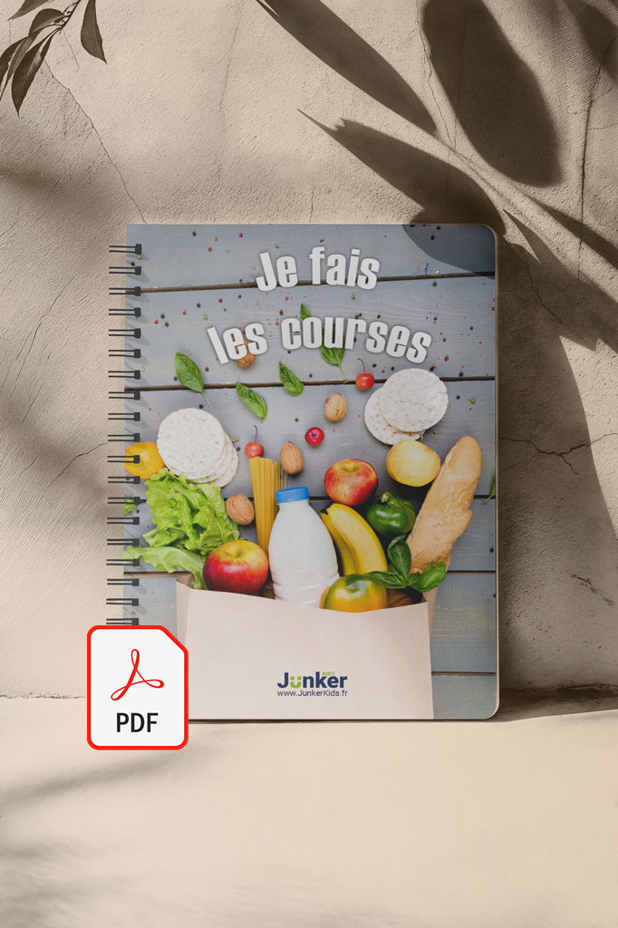 Image of a paper grocery bag filled with various fresh foods such as lettuce, apples, bananas, bread, and a bottle of milk. The text "Je fais les courses" is displayed in bold white letters above the bag, on a light wooden background. The scene represents a food shopping experience. The logo "Junker Kids" and the URL "www.JunkerKids.fr" appear at the bottom of the image.